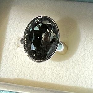 Swarovski ring silver tone with a grey stone. Sparkles